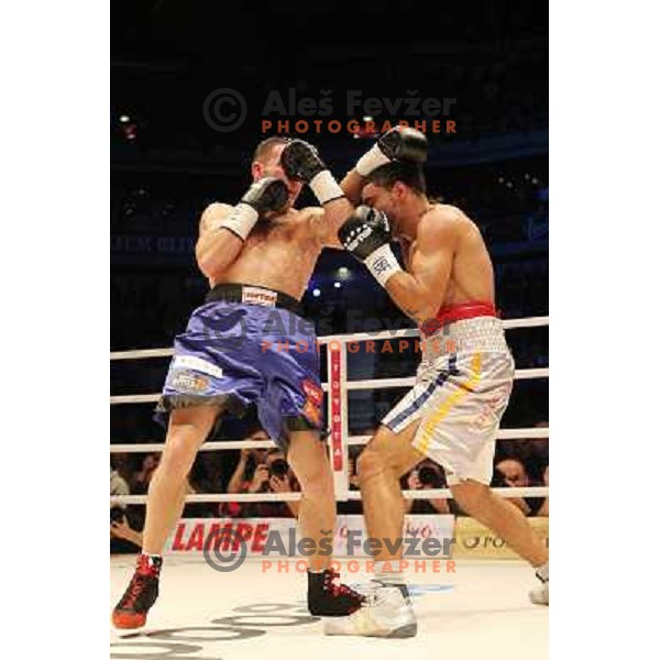 Dejan Zavec of Slovenia (blue trunks) IBF World Boxing Champion successfully defend his walterweight title with technical knockout (TKO) in fifth round against Paul Delgado of USA (white trunks) in front of 13.000 fans in Stozice, Ljubljana, Slovenia on F
