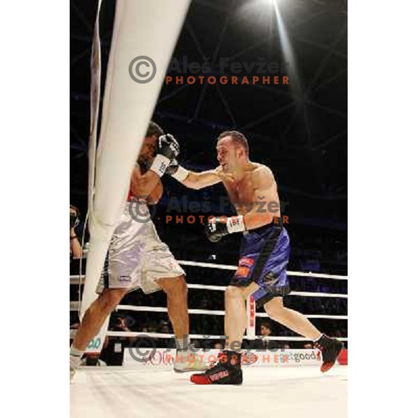 Dejan Zavec of Slovenia (blue trunks) IBF World Boxing Champion successfully defend his walterweight title with technical knockout (TKO) in fifth round against Paul Delgado of USA (white trunks) in front of 13.000 fans in Stozice, Ljubljana, Slovenia on F