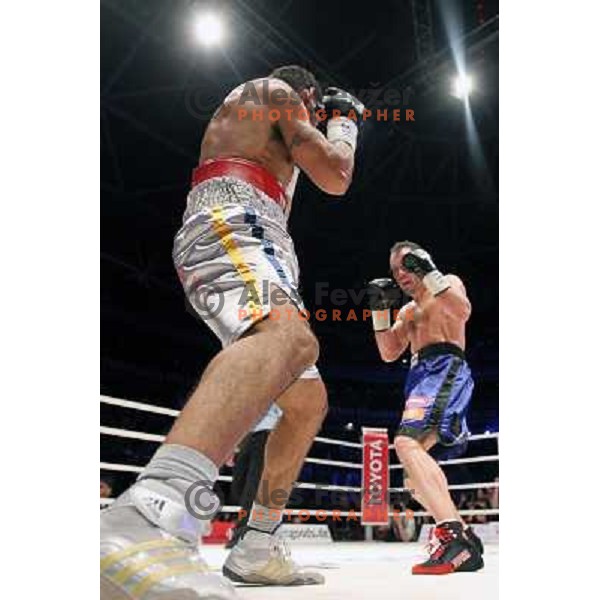 Dejan Zavec of Slovenia (blue trunks) IBF World Boxing Champion successfully defend his walterweight title with technical knockout (TKO) in fifth round against Paul Delgado of USA (white trunks) in front of 13.000 fans in Stozice, Ljubljana, Slovenia on F
