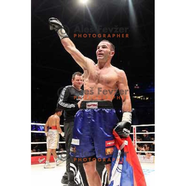 Dejan Zavec of Slovenia (blue trunks) IBF World Boxing Champion successfully defend his walterweight title with technical knockout (TKO) in fifth round against Paul Delgado of USA (white trunks) in front of 13.000 fans in Stozice, Ljubljana, Slovenia on F