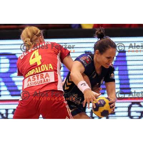 Arianne Geissmann of Krim Mercator (SLO) and of Oltchim Valcea (ROM) in action during handball match in Women\'s Championsleague played in Valcea, Romania on February 20, 2011 
