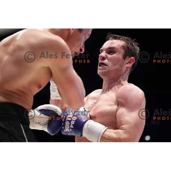 Sandro Siproshvili of GEO boxing with Denis Simcic of Slovenia in front of 13.000 fans in Stozice, Ljubljana, Slovenia on February 18,2011 