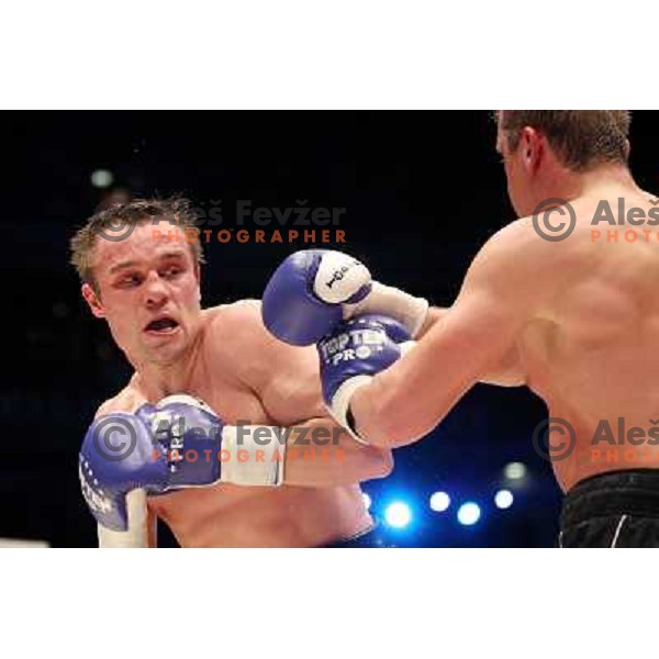 Sandro Siproshvili of GEO boxing with Denis Simcic of Slovenia in front of 13.000 fans in Stozice, Ljubljana, Slovenia on February 18,2011 