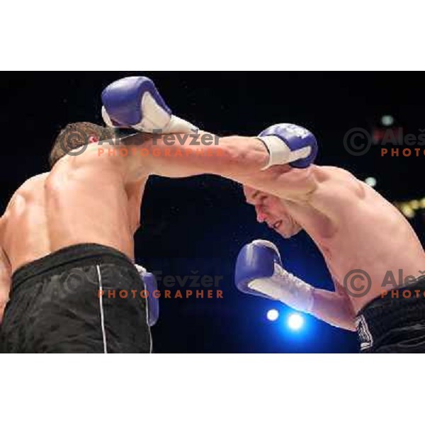 Sandro Siproshvili of GEO boxing with Denis Simcic of Slovenia in front of 13.000 fans in Stozice, Ljubljana, Slovenia on February 18,2011 