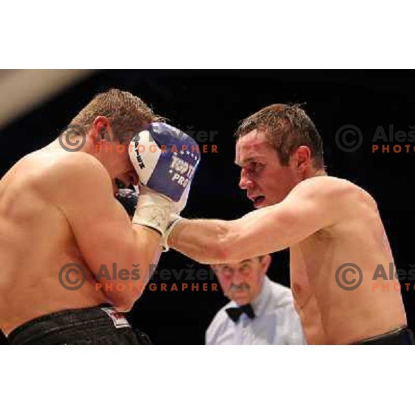 Sandro Siproshvili of GEO boxing with Denis Simcic of Slovenia in front of 13.000 fans in Stozice, Ljubljana, Slovenia on February 18,2011 