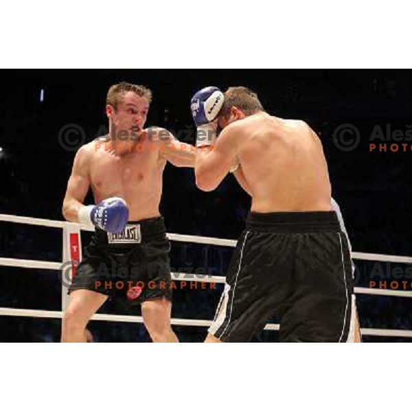  Sandro Siproshvili of GEO boxing with Denis Simcic of Slovenia in front of 13.000 fans in Stozice, Ljubljana, Slovenia on February 18,2011 