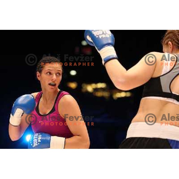 Christina Hammer of Germany (pink) successfully defend his WBF title with knockout (KO) in seventh round against Diana Kiss of Hungary (black) in front of 13.000 fans in Stozice, Ljubljana, Slovenia on February 18,2011Christina Hammer of Germany (pink) 