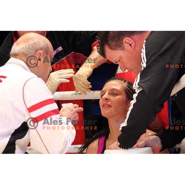 Christina Hammer of Germany (pink) successfully defend his WBF title with knockout (KO) in seventh round against Diana Kiss of Hungary (black) in front of 13.000 fans in Stozice, Ljubljana, Slovenia on February 18,2011Christina Hammer of Germany (pink) 