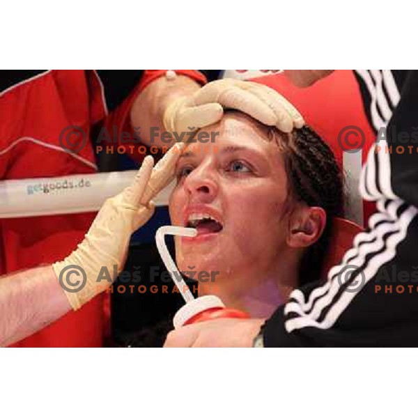 Christina Hammer of Germany (pink) successfully defend his WBF title with knockout (KO) in seventh round against Diana Kiss of Hungary (black) in front of 13.000 fans in Stozice, Ljubljana, Slovenia on February 18,2011Christina Hammer of Germany (pink) 