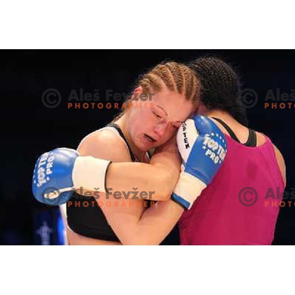 Christina Hammer of Germany (pink) successfully defend his WBF title with knockout (KO) in seventh round against Diana Kiss of Hungary (black) in front of 13.000 fans in Stozice, Ljubljana, Slovenia on February 18,2011Christina Hammer of Germany (pink) 