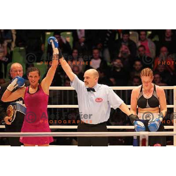 Christina Hammer of Germany (pink) successfully defend his WBF title with knockout (KO) in seventh round against Diana Kiss of Hungary (black) in front of 13.000 fans in Stozice, Ljubljana, Slovenia on February 18,2011Christina Hammer of Germany (pink) 