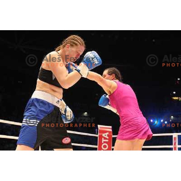 Christina Hammer of Germany (pink) successfully defend his WBF title with knockout (KO) in seventh round against Diana Kiss of Hungary (black) in front of 13.000 fans in Stozice, Ljubljana, Slovenia on February 18,2011Christina Hammer of Germany (pink) 