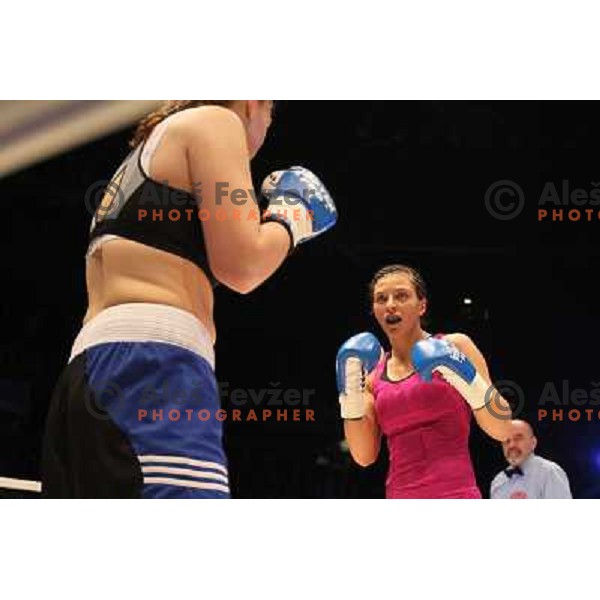 Christina Hammer of Germany (pink) successfully defend his WBF title with knockout (KO) in seventh round against Diana Kiss of Hungary (black) in front of 13.000 fans in Stozice, Ljubljana, Slovenia on February 18,2011Christina Hammer of Germany (pink) 