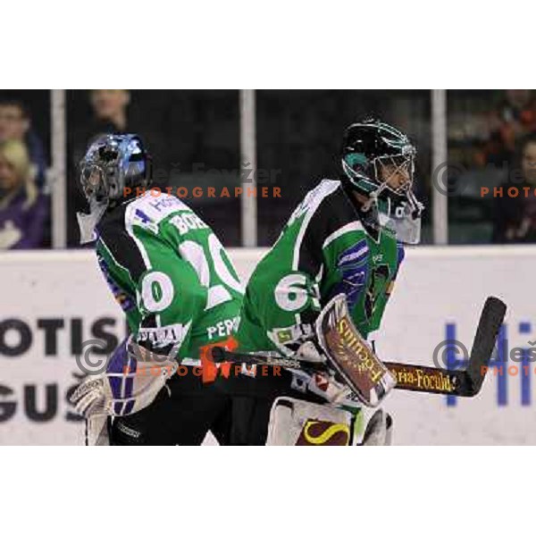 Matic Boh, Matija Pintaric of Tilia Olimpija in action during ice-hockey match Tilia Olimpija- KAC in round 54 of EBEL league, played in Hala Tivoli, Ljubljana, Slovenia on Feburay 25,2011 