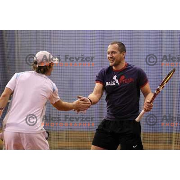 Blaz Kavcic and Jure Kosir of Slovenia during exhibition tennis match in Hala Tivoli, Ljubljana, Slovenia on January 28,2010 