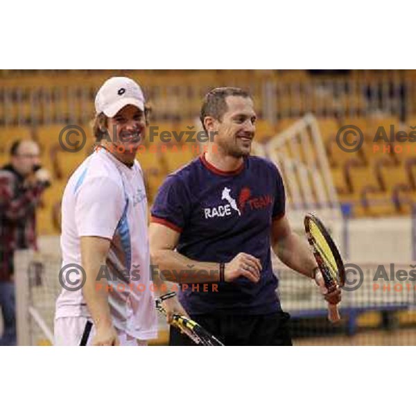 Blaz Kavcic and Jure Kosir of Slovenia during exhibition tennis match in Hala Tivoli, Ljubljana, Slovenia on January 28,2010 