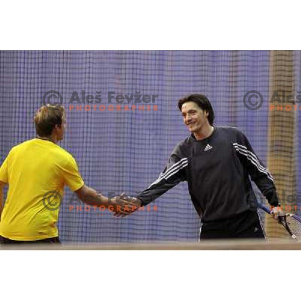 Grega Zemlja and Miran Pavlin of Slovenia during exhibition tennis match in Hala Tivoli, Ljubljana, Slovenia on January 28,2010 