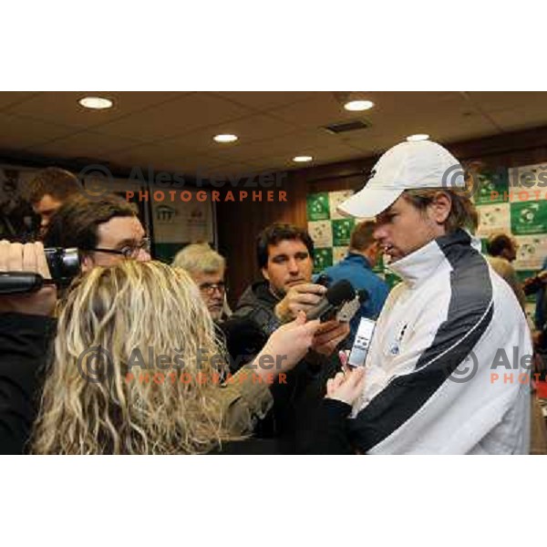 Blaz Kavcic of Slovenia talks to journalists after offical draw for Davis Cup match, Hala Tivoli, Ljubljana, Slovenia on March 3, 2011 