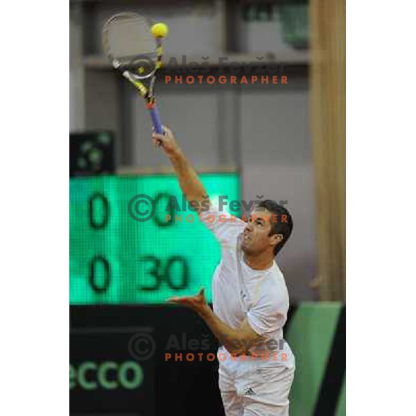 Luka Gregorc of Slovenia in action during doubles match at day 1 of Davis Cup match Slovenia- Finland , played in Hala Tivoli, Ljubljana, Slovenia on March 5, 2011 