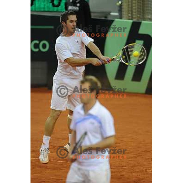 Luka Gregorc and Grega Zemlja of Slovenia in action during doubles match at day 1 of Davis Cup match Slovenia- Finland , played in Hala Tivoli, Ljubljana, Slovenia on March 5, 2011 