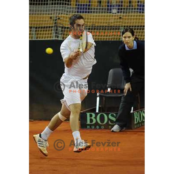Luka Gregorc of Slovenia in action during doubles match at day 1 of Davis Cup match Slovenia- Finland , played in Hala Tivoli, Ljubljana, Slovenia on March 5, 2011 