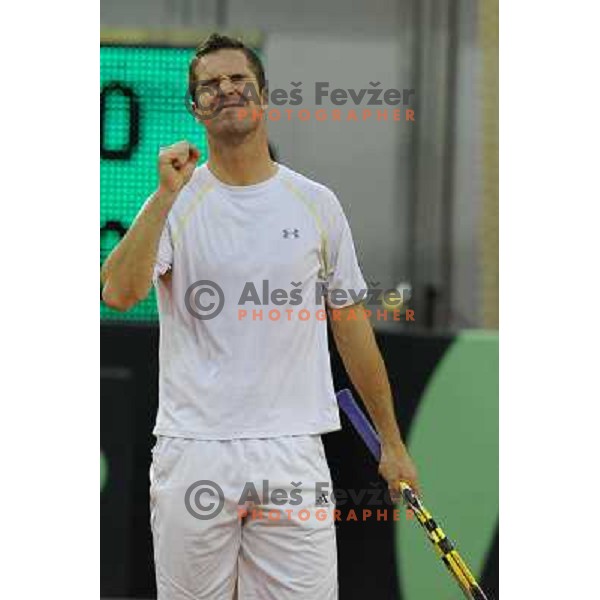 Luka Gregorc of Slovenia in action during doubles match at day 1 of Davis Cup match Slovenia- Finland , played in Hala Tivoli, Ljubljana, Slovenia on March 5, 2011 