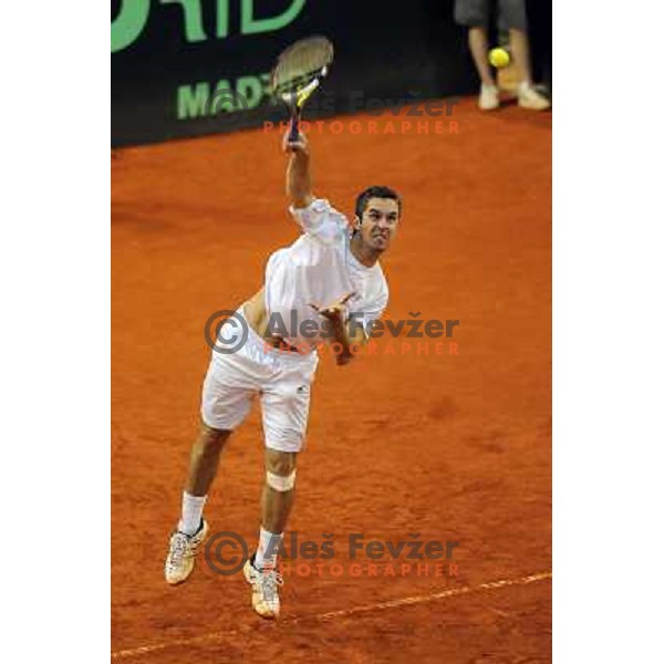Luka Gregorc of Slovenia in action during doubles match at day 1 of Davis Cup match Slovenia- Finland , played in Hala Tivoli, Ljubljana, Slovenia on March 5, 2011 