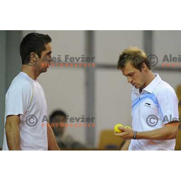 Luka Gregorc and Grega Zemlja of Slovenia in action during doubles match at day 1 of Davis Cup match Slovenia- Finland , played in Hala Tivoli, Ljubljana, Slovenia on March 5, 2011 