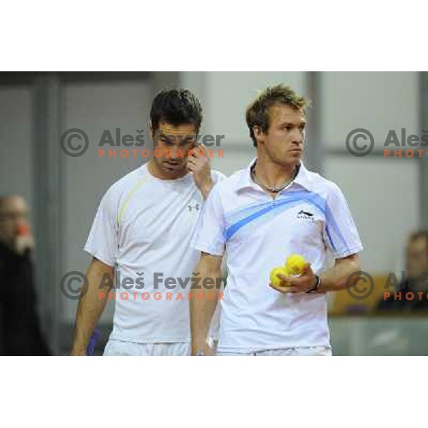 Luka Gregorc and Grega Zemlja of Slovenia in action during doubles match at day 1 of Davis Cup match Slovenia- Finland , played in Hala Tivoli, Ljubljana, Slovenia on March 5, 2011 