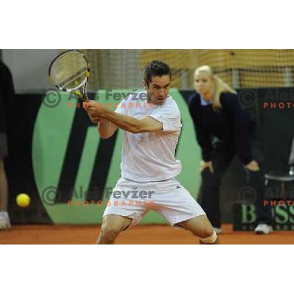 Luka Gregorc of Slovenia in action during doubles match at day 1 of Davis Cup match Slovenia- Finland , played in Hala Tivoli, Ljubljana, Slovenia on March 5, 2011 