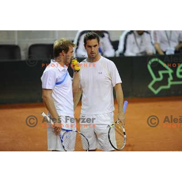 Luka Gregorc and Grega Zemlja of Slovenia in action during doubles match at day 1 of Davis Cup match Slovenia- Finland , played in Hala Tivoli, Ljubljana, Slovenia on March 5, 2011 