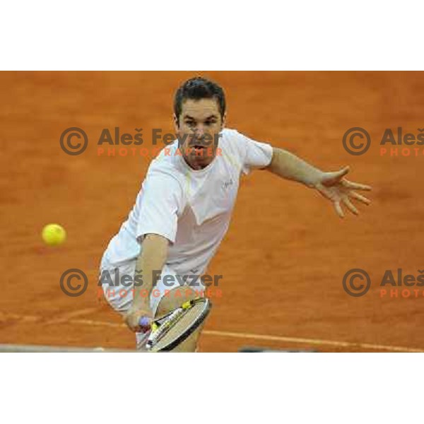 Luka Gregorc of Slovenia in action during doubles match at day 1 of Davis Cup match Slovenia- Finland , played in Hala Tivoli, Ljubljana, Slovenia on March 5, 2011 