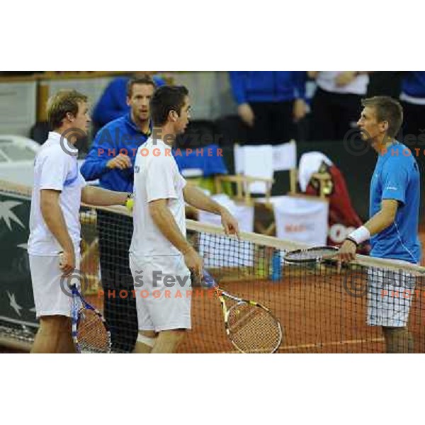 Luka Gregorc and Grega Zemlja of Slovenia in action during doubles match at day 1 of Davis Cup match Slovenia- Finland , played in Hala Tivoli, Ljubljana, Slovenia on March 5, 2011 