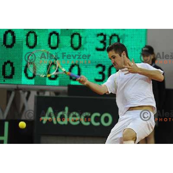 Luka Gregorc of Slovenia in action during doubles match at day 1 of Davis Cup match Slovenia- Finland , played in Hala Tivoli, Ljubljana, Slovenia on March 5, 2011 