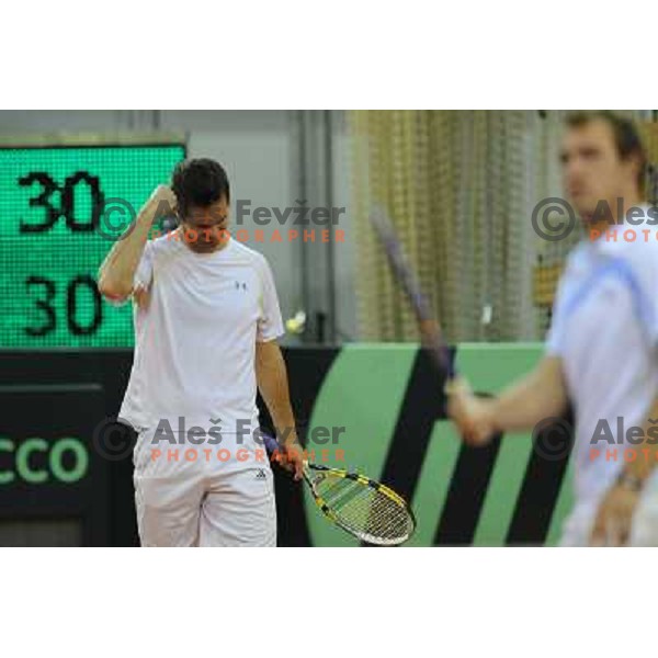 Luka Gregorc of Slovenia in action during doubles match at day 1 of Davis Cup match Slovenia- Finland , played in Hala Tivoli, Ljubljana, Slovenia on March 5, 2011 