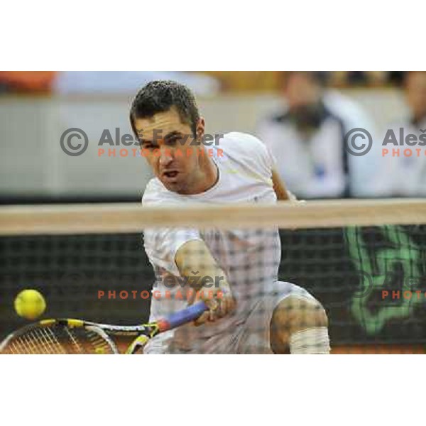 Luka Gregorc of Slovenia in action during doubles match at day 1 of Davis Cup match Slovenia- Finland , played in Hala Tivoli, Ljubljana, Slovenia on March 5, 2011 