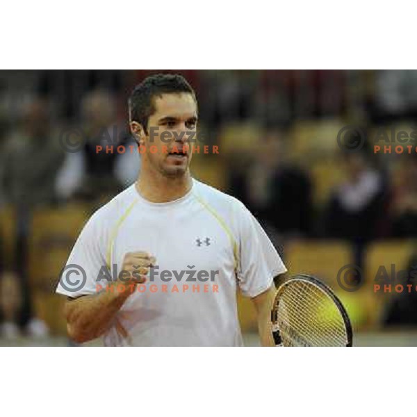 Luka Gregorc of Slovenia in action during doubles match at day 1 of Davis Cup match Slovenia- Finland , played in Hala Tivoli, Ljubljana, Slovenia on March 5, 2011 