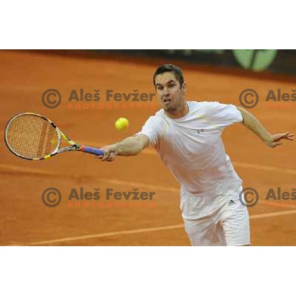 Luka Gregorc of Slovenia in action during doubles match at day 1 of Davis Cup match Slovenia- Finland , played in Hala Tivoli, Ljubljana, Slovenia on March 5, 2011 