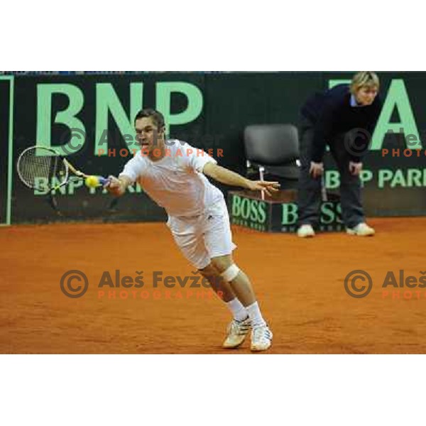 Luka Gregorc of Slovenia in action during doubles match at day 1 of Davis Cup match Slovenia- Finland , played in Hala Tivoli, Ljubljana, Slovenia on March 5, 2011 