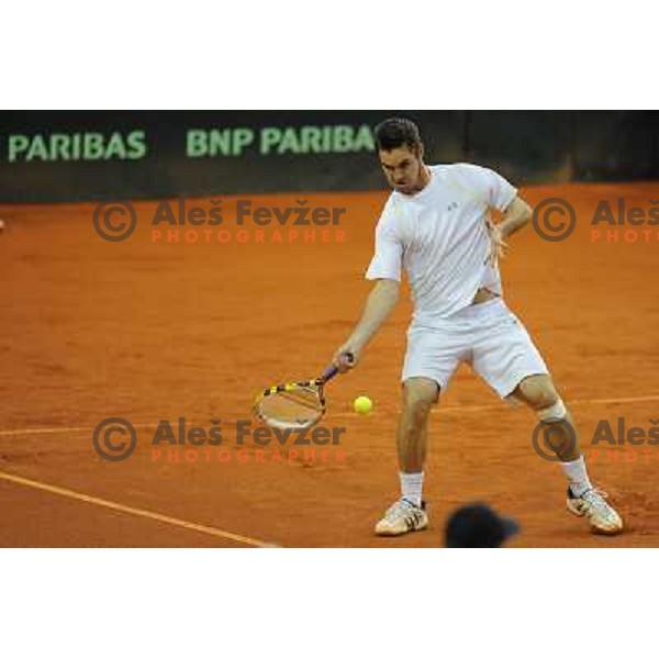 Luka Gregorc of Slovenia in action during doubles match at day 1 of Davis Cup match Slovenia- Finland , played in Hala Tivoli, Ljubljana, Slovenia on March 5, 2011 