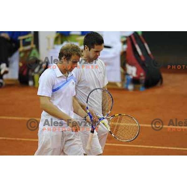 Luka Gregorc and Grega Zemlja of Slovenia in action during doubles match at day 1 of Davis Cup match Slovenia- Finland , played in Hala Tivoli, Ljubljana, Slovenia on March 5, 2011 