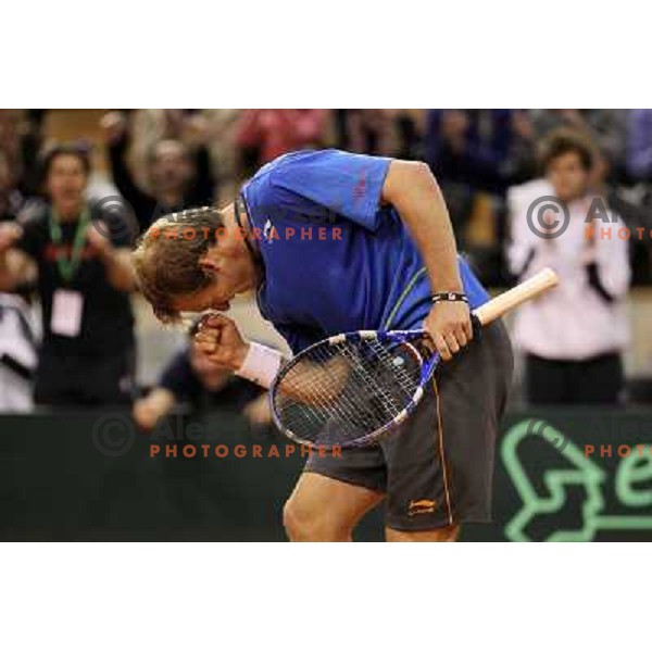 Grega Zemlja of Slovenia celebrates victory 3:2 in Davis Cup match Slovenia- Finland, played in Hala Tivoli, Ljubljana, Slovenia on March 6, 2011 