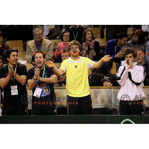 Coach Ziga Janskovec, Blaz Kavcic, Luka Gregorc, Grega Zemlja, Captain Blaz Trupej and players and staff of Slovenia celebrate victory 3:2 in Davis Cup match Slovenia- Finland, played in Hala Tivoli, Ljubljana, Slovenia on March 6, 2011 