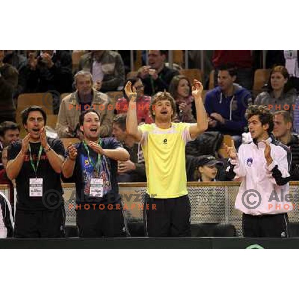 Coach Ziga Janskovec, Blaz Kavcic, Luka Gregorc, Grega Zemlja, Captain Blaz Trupej and players and staff of Slovenia celebrate victory 3:2 in Davis Cup match Slovenia- Finland, played in Hala Tivoli, Ljubljana, Slovenia on March 6, 2011 