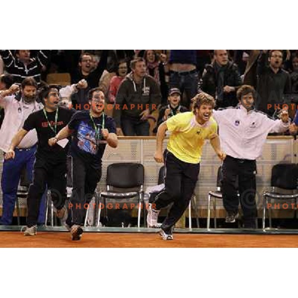 Coach Ziga Janskovec, Blaz Kavcic, Luka Gregorc, Grega Zemlja, Captain Blaz Trupej and players and staff of Slovenia celebrate victory 3:2 in Davis Cup match Slovenia- Finland, played in Hala Tivoli, Ljubljana, Slovenia on March 6, 2011 