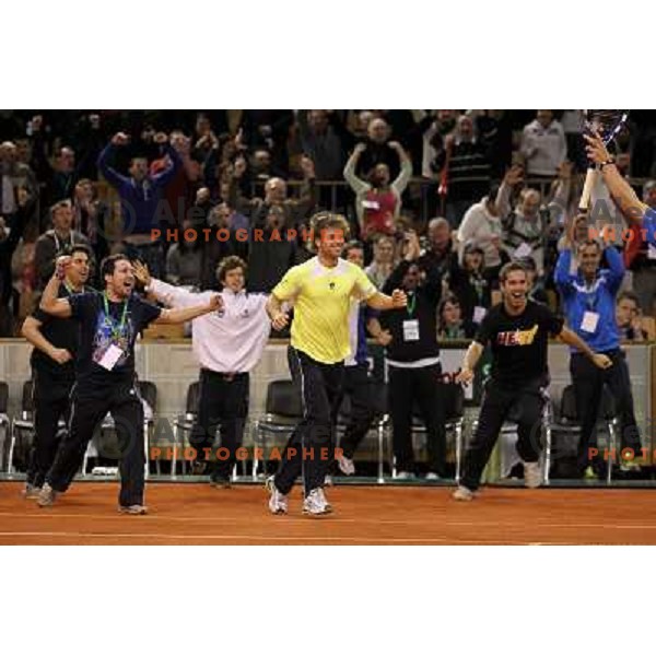 Coach Ziga Janskovec, Blaz Kavcic, Luka Gregorc, Grega Zemlja, Captain Blaz Trupej and players and staff of Slovenia celebrate victory 3:2 in Davis Cup match Slovenia- Finland, played in Hala Tivoli, Ljubljana, Slovenia on March 6, 2011 