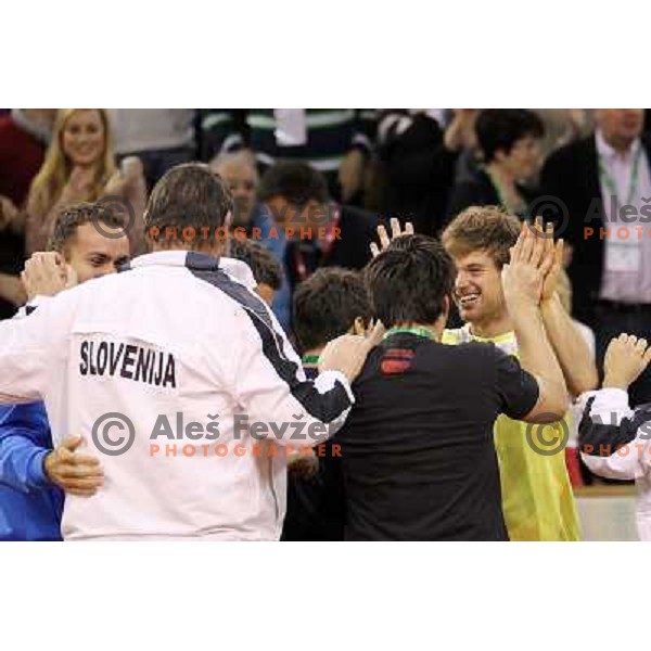 Coach Ziga Janskovec, Blaz Kavcic, Luka Gregorc, Grega Zemlja, Captain Blaz Trupej and players and staff of Slovenia celebrate victory 3:2 in Davis Cup match Slovenia- Finland, played in Hala Tivoli, Ljubljana, Slovenia on March 6, 2011 