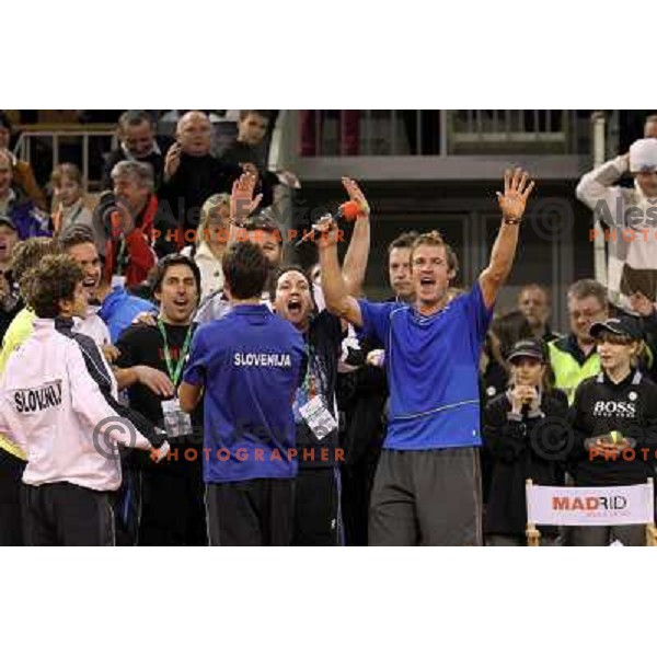Coach Ziga Janskovec, Blaz Kavcic, Luka Gregorc, Grega Zemlja, Captain Blaz Trupej and players and staff of Slovenia celebrate victory 3:2 in Davis Cup match Slovenia- Finland, played in Hala Tivoli, Ljubljana, Slovenia on March 6, 2011 