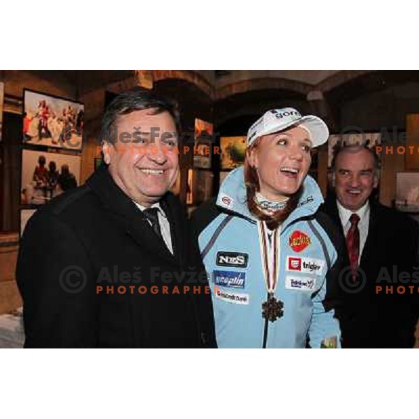 Mayor of Ljubljana and Petra Majdic of Slovenia with bronze medal from Ladies free sprint event at 2010 Oslo Nordic World Championships at official reception in front of Ljubljana Town Hall, Slovenia on March 8, 2011 