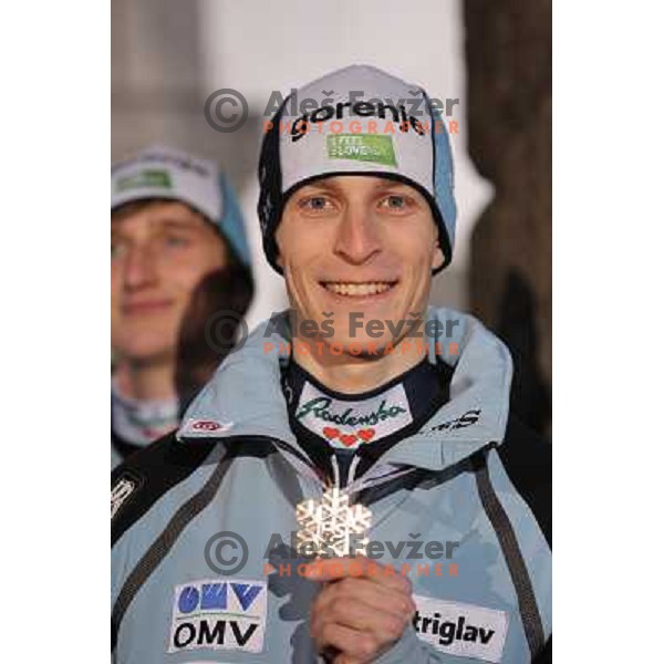 Jurij Tepes of Slovenia with bronze medal from Ski jumping team event at 2010 Oslo Nordic World Championships at official reception in front of Ljubljana Town Hall, Slovenia on March 8, 2011 